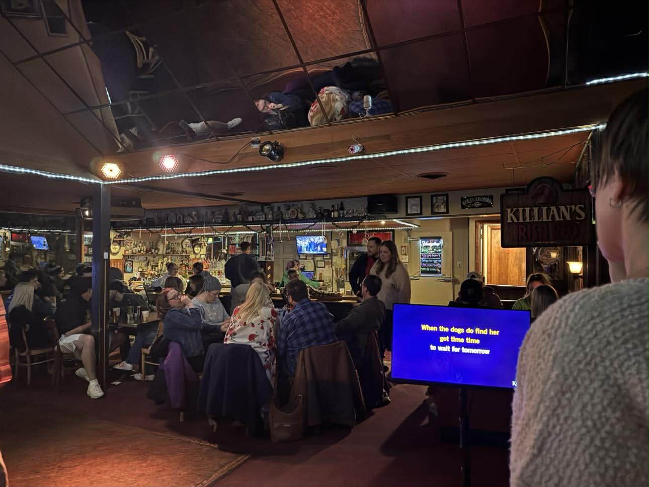 Full house at a cozy venue karaoke night